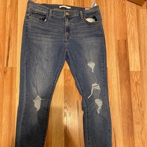Levi’s supper skinny jean size 32 waist aka 12